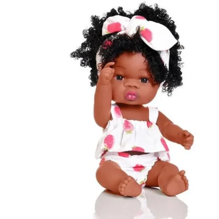 Cute doll with curly hair wearing a strawberry-themed outfit and bow headband.