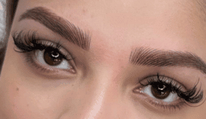 Close-up of perfectly shaped and styled eyebrows.