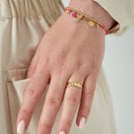 Goudkleurige ring met schelpjes
