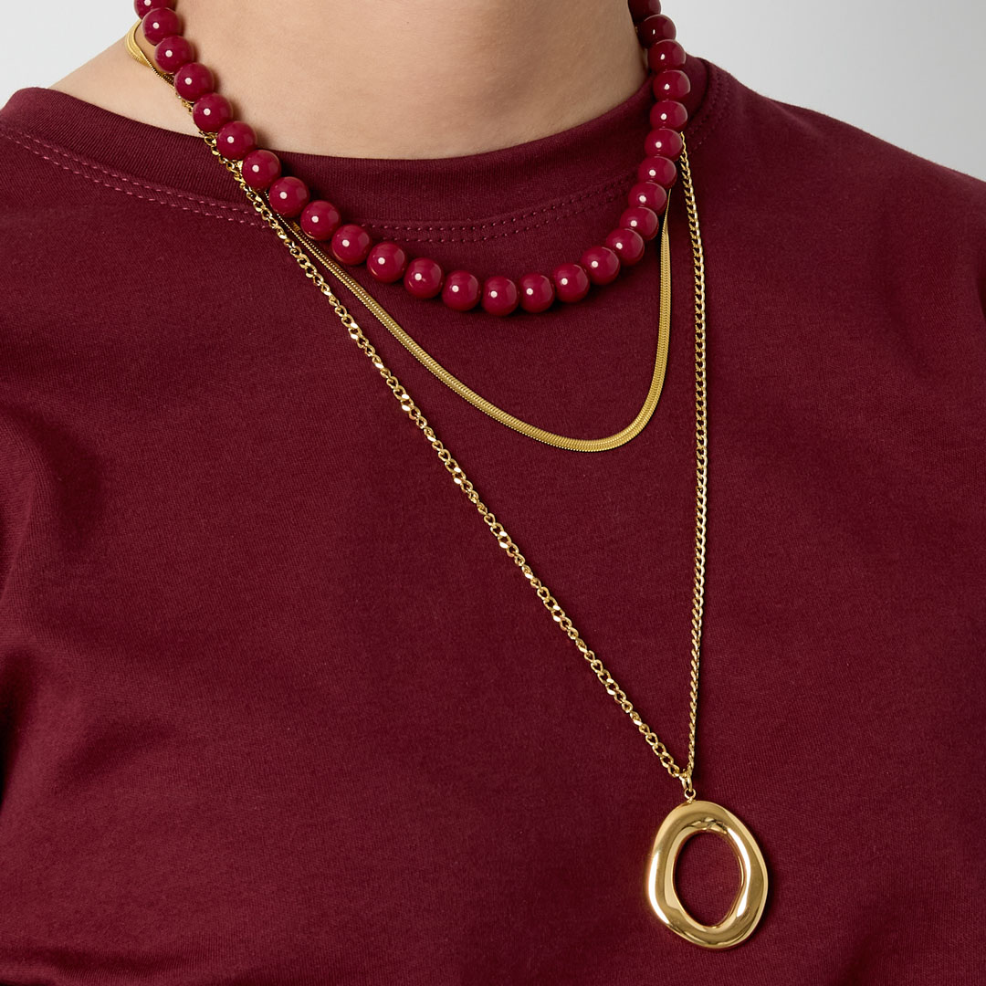 Ketting met organische ovaal vormige hanger · Goudkleur