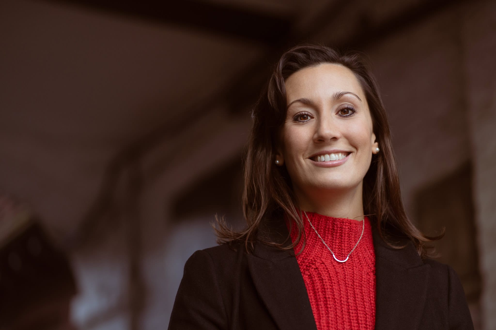 Jess Ratcliffe, a confident coach, photographed by a London brand photographer in natural light