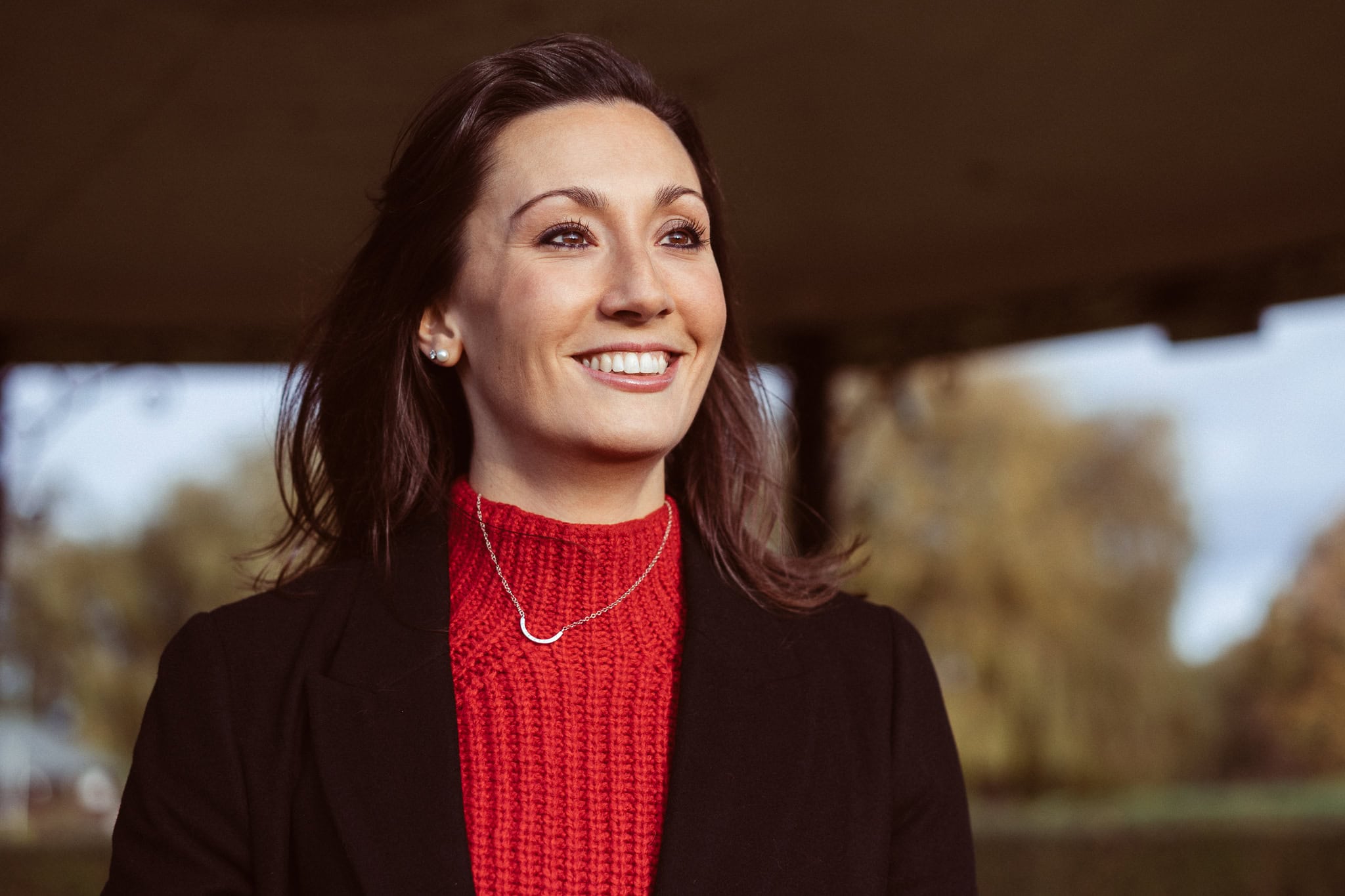 Jess Ratcliffe, a confident coach, in a natural London setting with soft light. Brand photography for coaches.