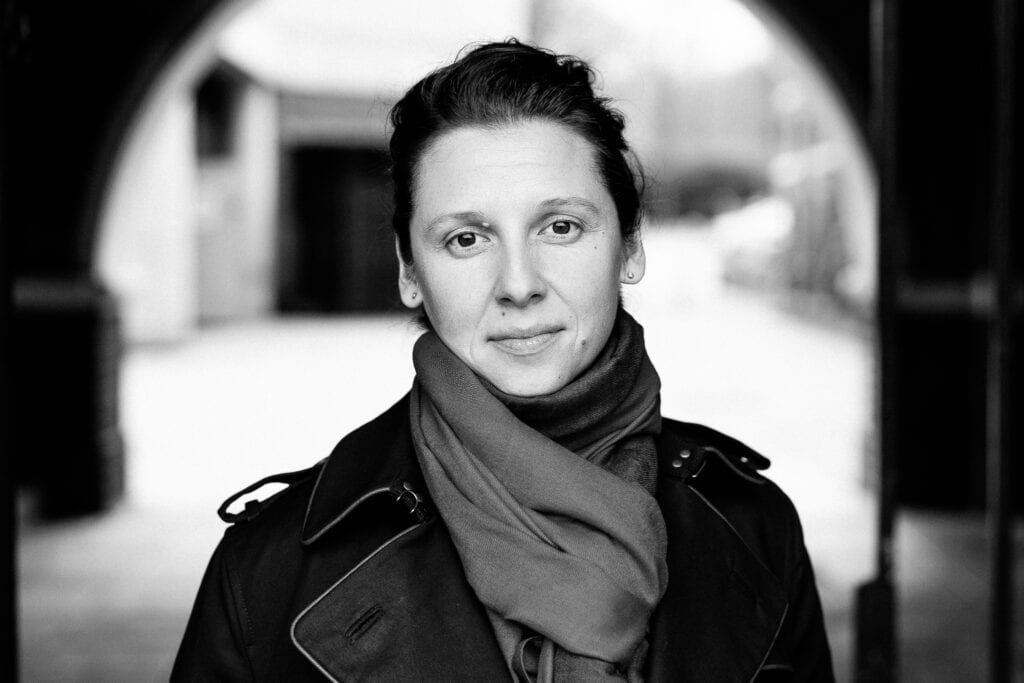 Moni Soos, a coach, photographed by Phil Askew, a London brand photographer, with authentic presence.