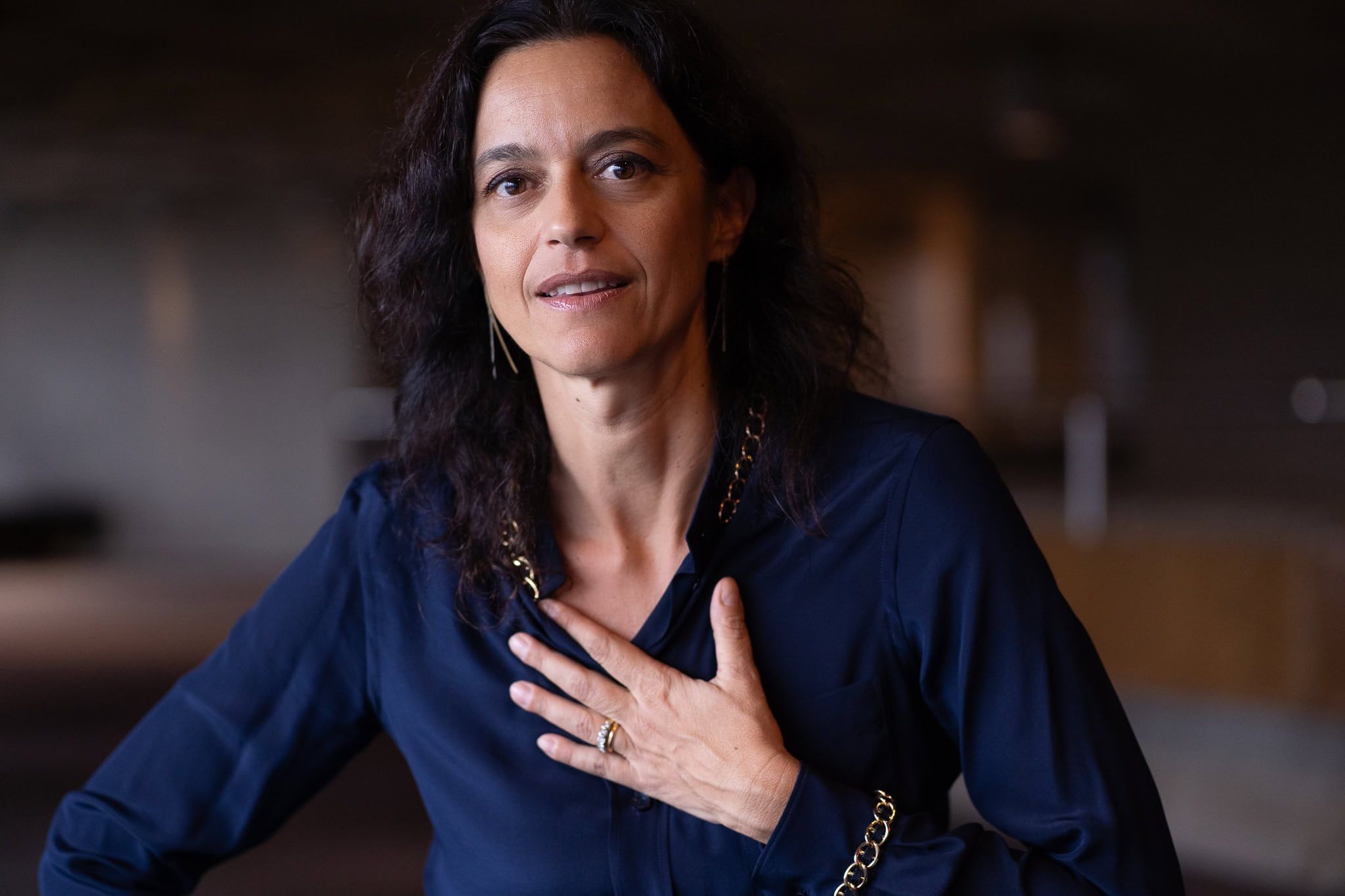 Vittoria Zipoli, a confident leader, in a warm, natural light portrait by a London brand photographer.