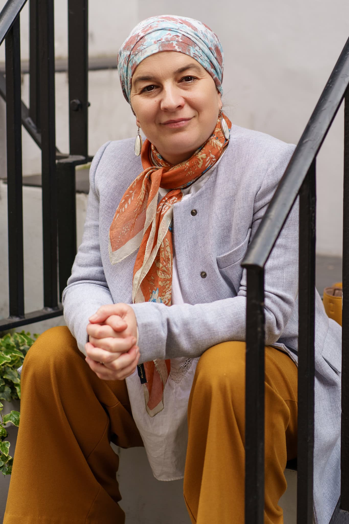 London brand photographer Phil Askew captures a confident, authentic portrait of a woman in a light-filled London setting.