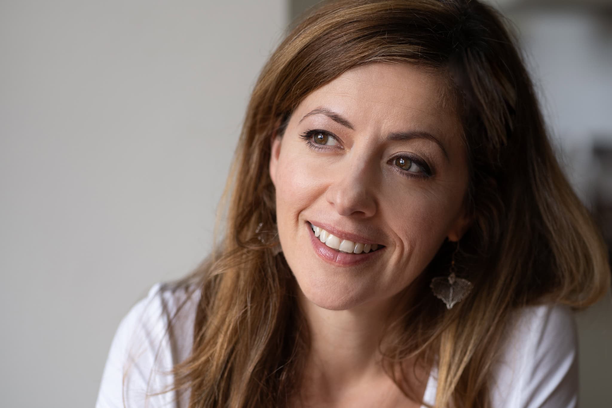 Fiona Buckland, a coach, photographed with soft light by a London brand photographer.