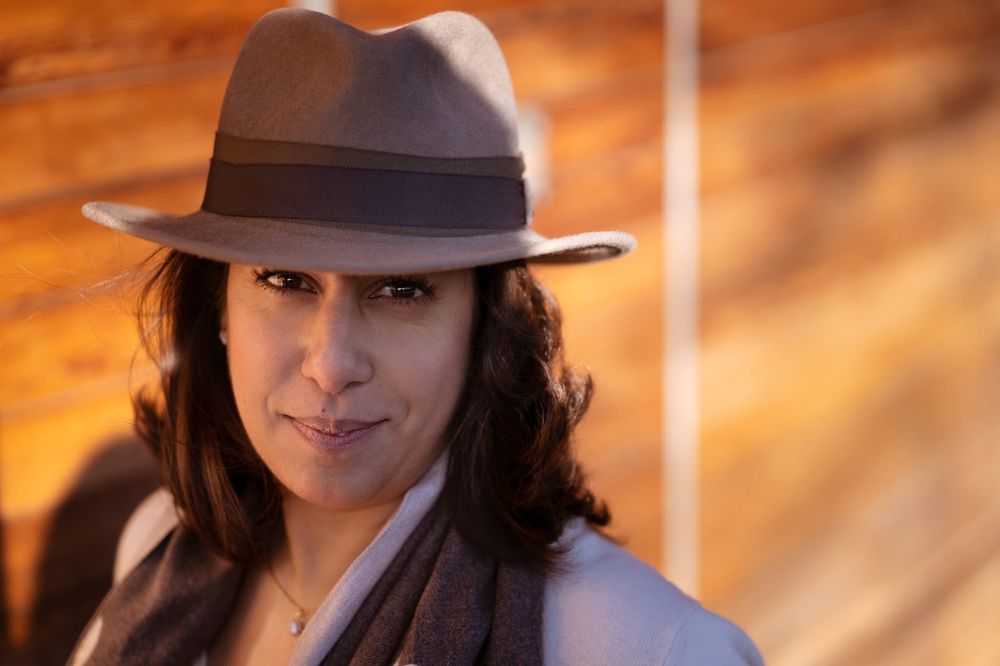 Eleonora Chessa in a stylish hat, captured by a London brand photographer.