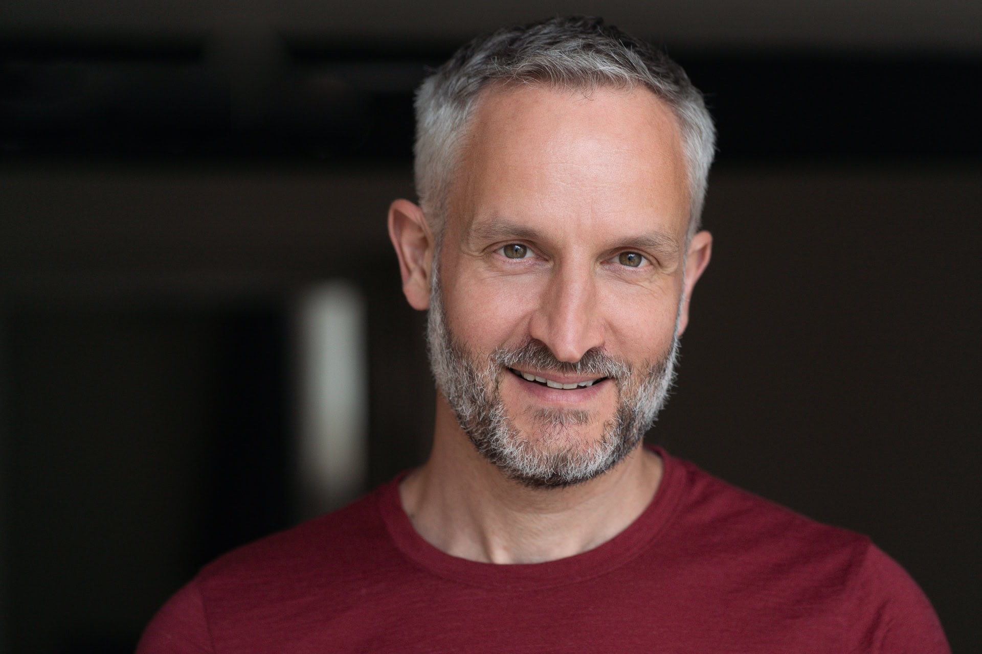 Andrew Willson, a confident coach, photographed in soft London light by a brand photographer.