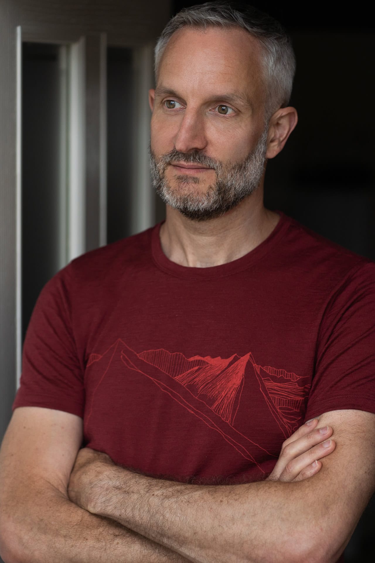 Andrew Willson, a London brand photographer's subject, with a confident, authentic presence, captured in soft light.