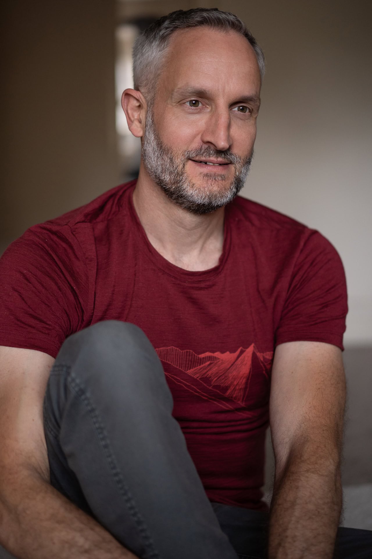 Andrew Willson, a coach, in a warm, naturally lit portrait by London brand photographer Phil Askew.