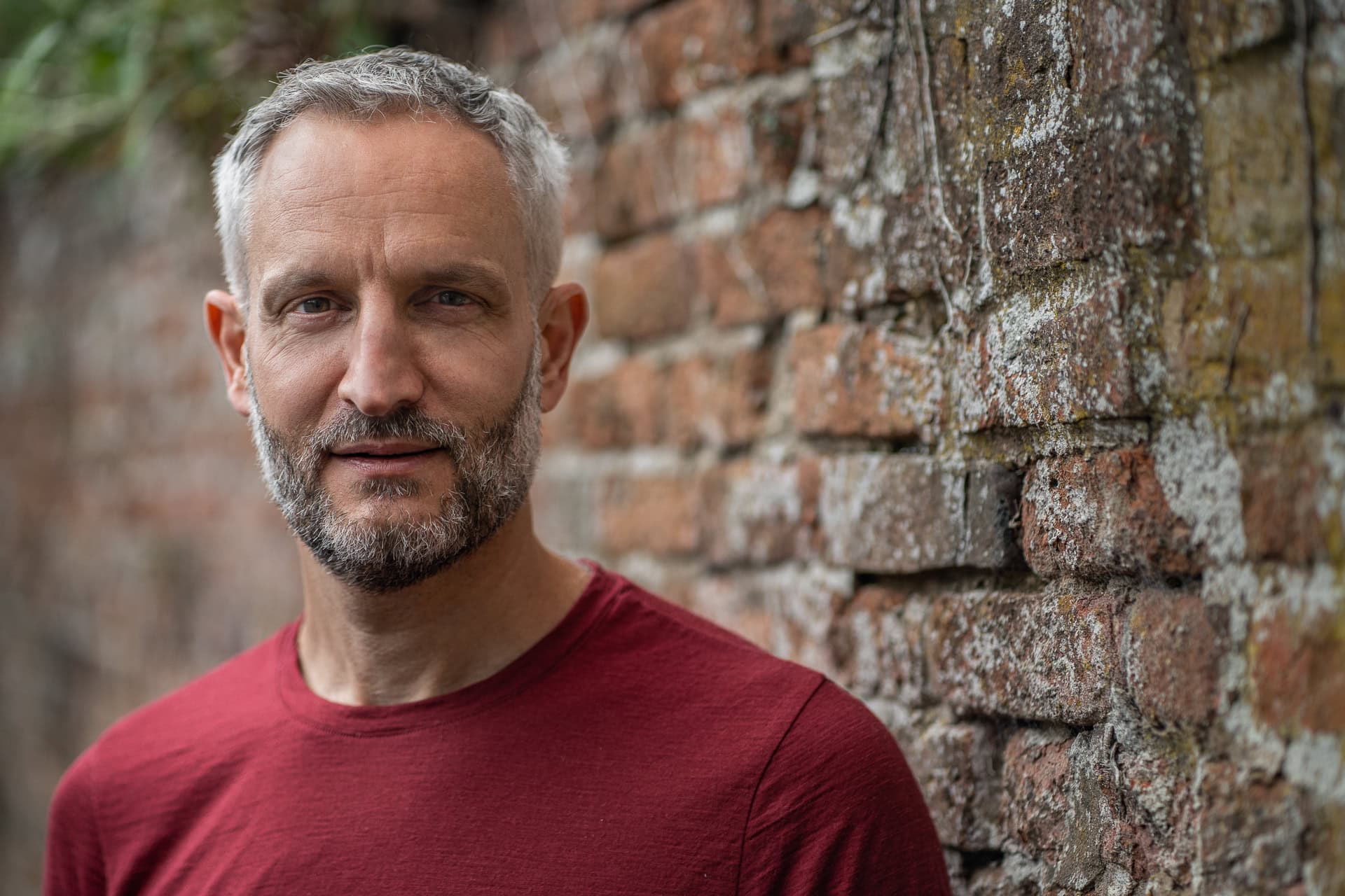 Andrew Willson, a confident coach, photographed by a London brand photographer in natural light.