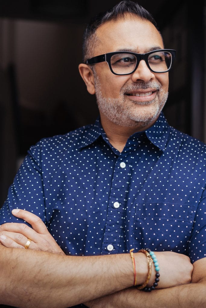 Dipak Dave, a confident and authentic subject, in a London brand photography portrait.