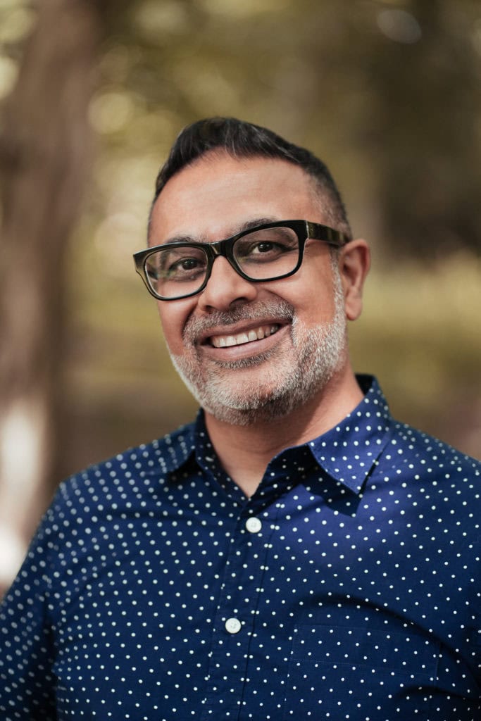 Dipak Dave, a coach, in a professional London brand portrait by Phil Askew.