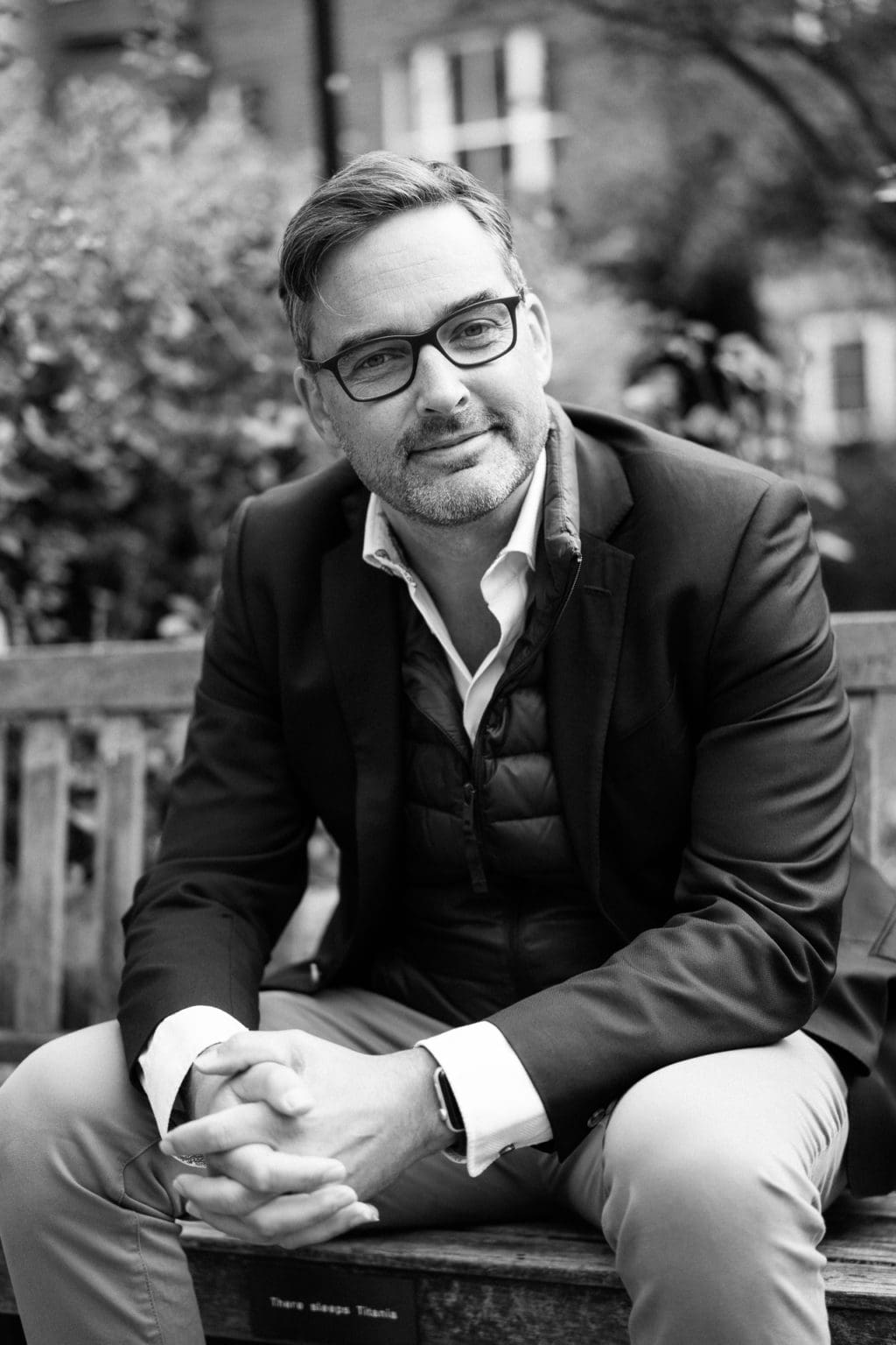 Phil Askew, London brand photographer, capturing a confident coach in natural light.