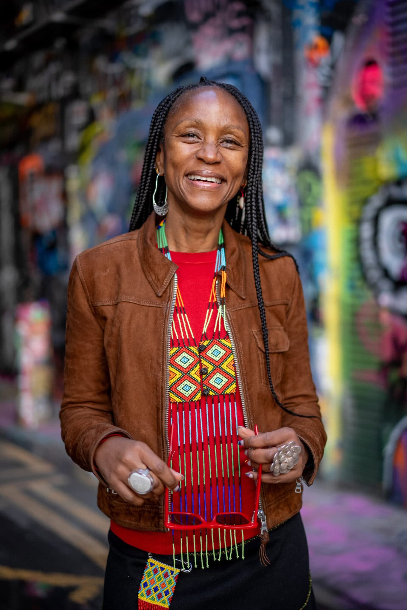 Phil Askew, London brand photographer, capturing a confident coach's personal brand portrait in vibrant East London.