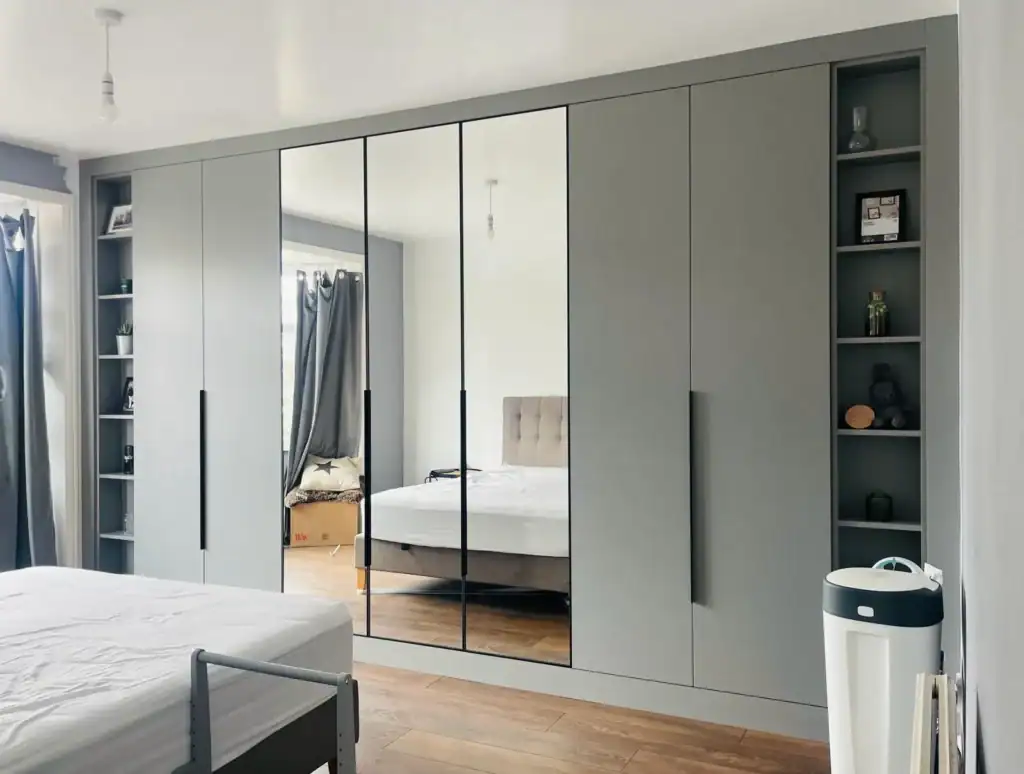 Custom Made Wardrobes with Mirrored Doors for Modern Bedroom Storage.