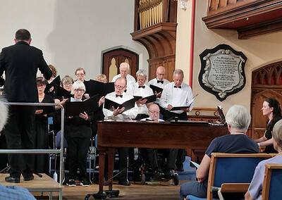 Elegant Macclesfield choir rehearsing in historic church for Oriana Choir performances.