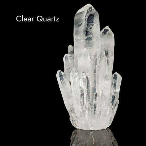 clear quartz crystals with black background