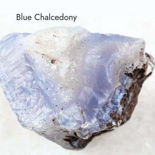 blue chalcedony crystal with white background