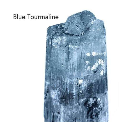 blue tourmaline crystal with white background
