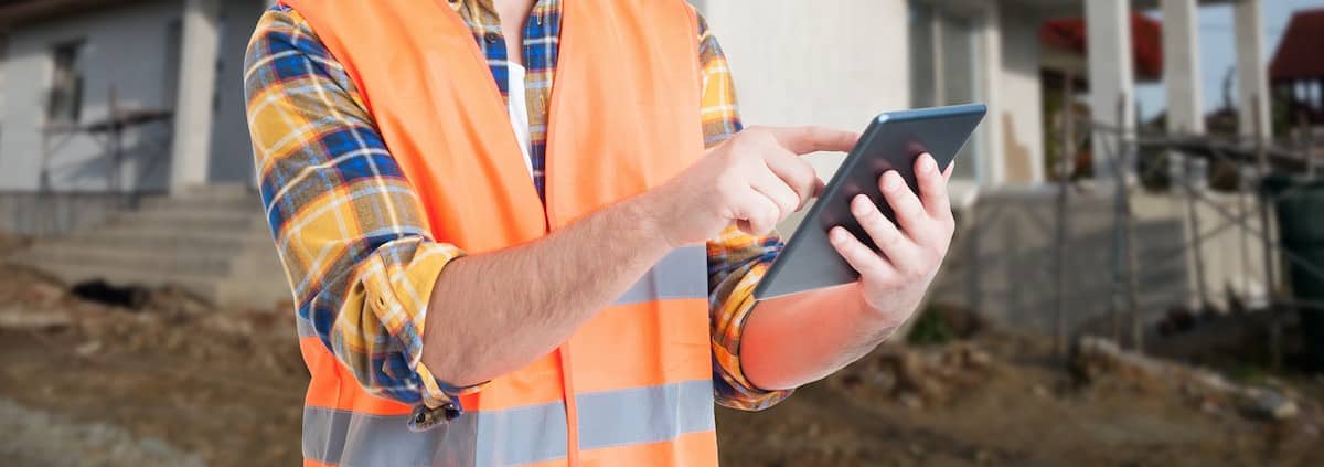 Land surveyor helping person buying real estate.