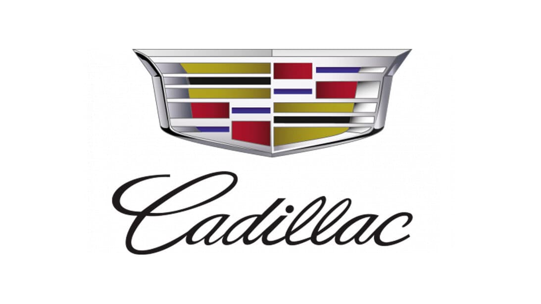 Cadillac logo with chrome emblem and elegant script font, representing luxury automotive brand.