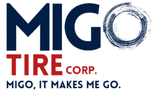 Migo Tire Corp. logo with bold text and circular design element.