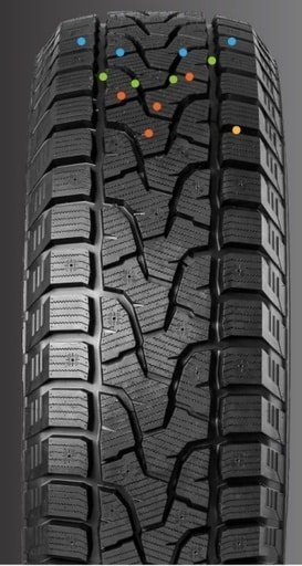 Close-up of a rugged winter tire with detailed tread pattern.