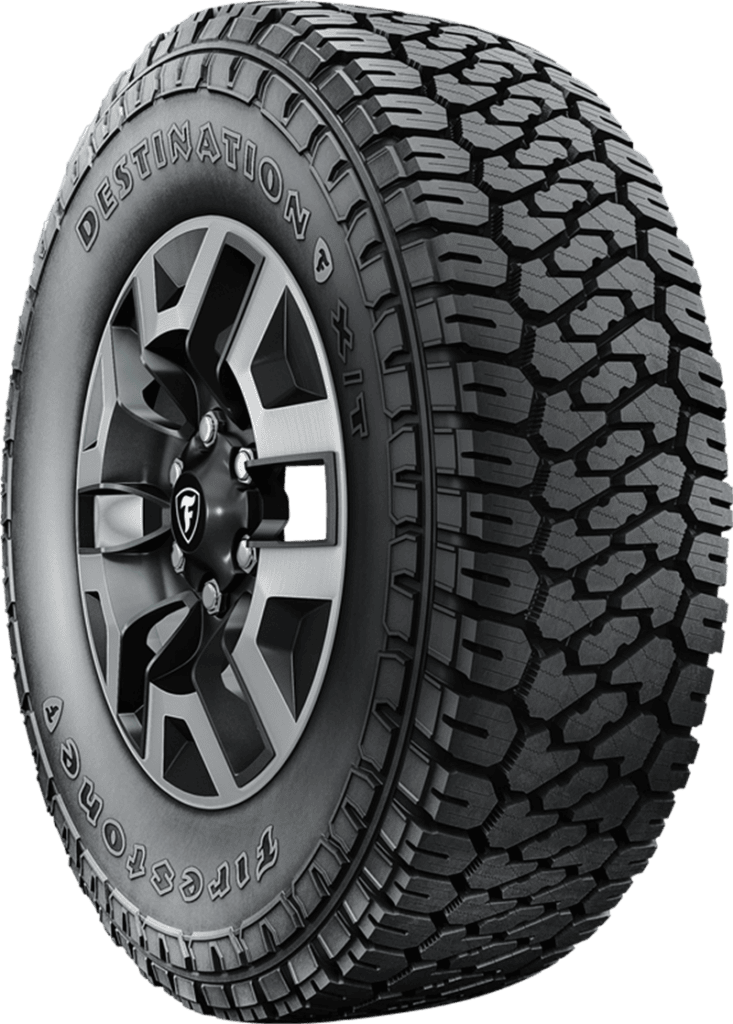 Firestone Destination XT tire with rugged tread for all-weather performance.