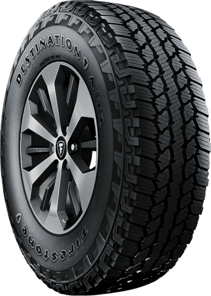 Firestone Destination AT2 tire with rugged all-terrain tread pattern.