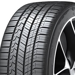 High-performance car tire with detailed tread pattern for optimal grip.