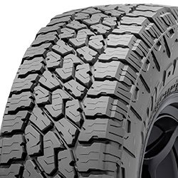All-terrain tire with rugged tread pattern for off-road and on-road use.