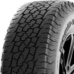 All-weather tire with rugged tread pattern for off-road and on-road use.