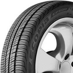 Close-up of a car tire with detailed tread pattern and alloy wheel.