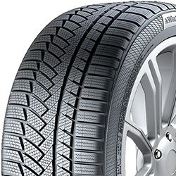 Close-up of a winter tire with detailed tread pattern for snow and ice traction.