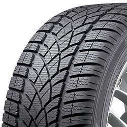 Close-up of a rugged all-terrain tire with detailed tread pattern.