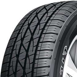 Close-up of Firestone Destination LE3 all-season tire tread pattern.