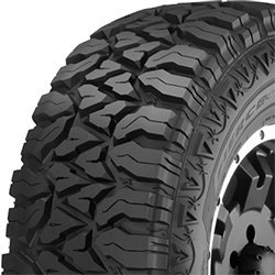 Close-up of rugged off-road tire with deep tread pattern.
