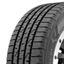 Close-up of a Goodyear Wrangler Steadfast HT tire with detailed tread pattern.