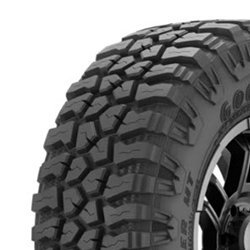 Off-road tire with rugged tread pattern for durability and traction.