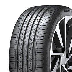 Close-up of a Migo Tire with detailed tread pattern and alloy wheel.