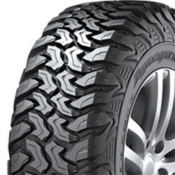 All-terrain tire with rugged tread pattern for off-road and on-road use.
