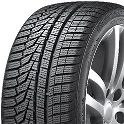 All-season tire with detailed tread pattern for optimal traction and durability.