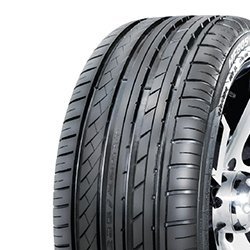 High-performance car tire with detailed tread pattern for optimal grip.