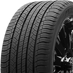 Close-up of a Michelin Latitude Tour HP tire with detailed tread pattern.