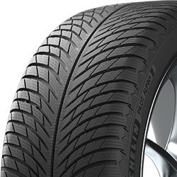 Close-up of Michelin Pilot Alpin 5 winter tire with detailed tread pattern.
