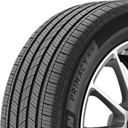 Close-up of Michelin Primacy A/S all-season tire on a vehicle.