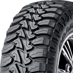 Off-road tire with aggressive tread pattern for all-season use.