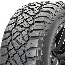 All-terrain tire with rugged tread pattern for off-road use.
