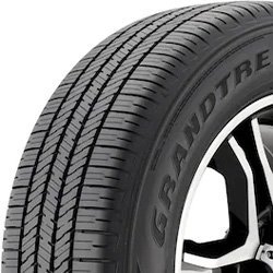 Close-up of a Migo Tire Corp. tire showcasing tread pattern and sidewall details.